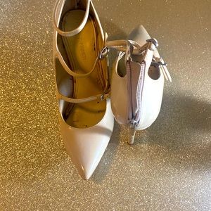 Beige Patent leather gently used Marc Fisher size 8, with a 3 inch heel.